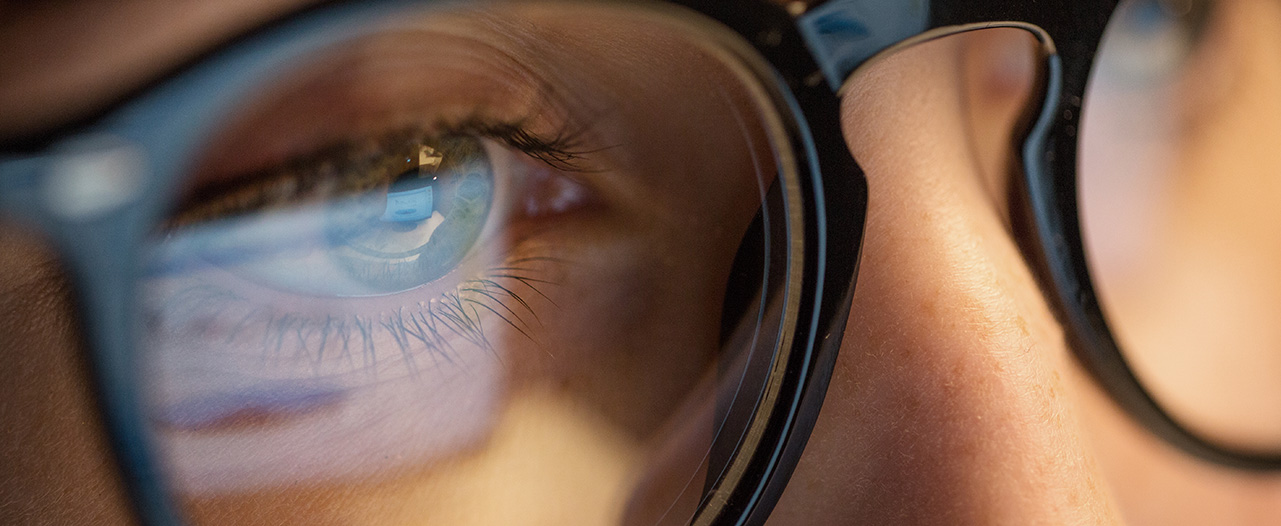 close up of woman's eyes wearing glasses